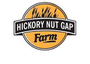 Logo of Hickory Nut Gap Farm with a wheat graphic.